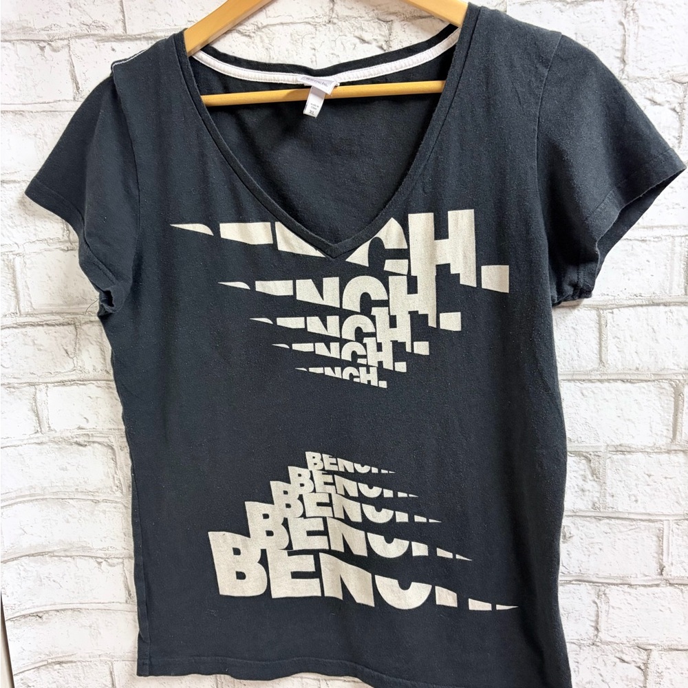 Bench Black V‑Neck Tee with Cream Logo Graphic